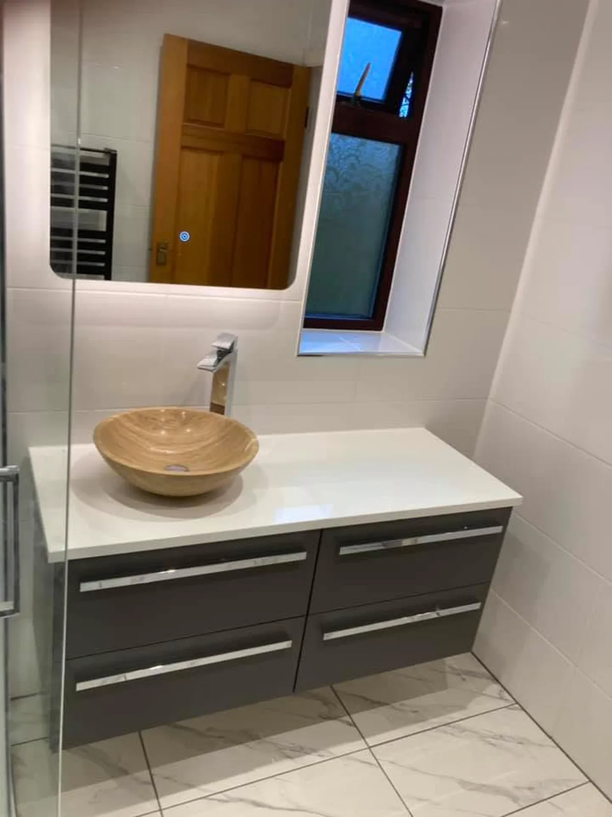 Bathroom vanity installation with vessel sink